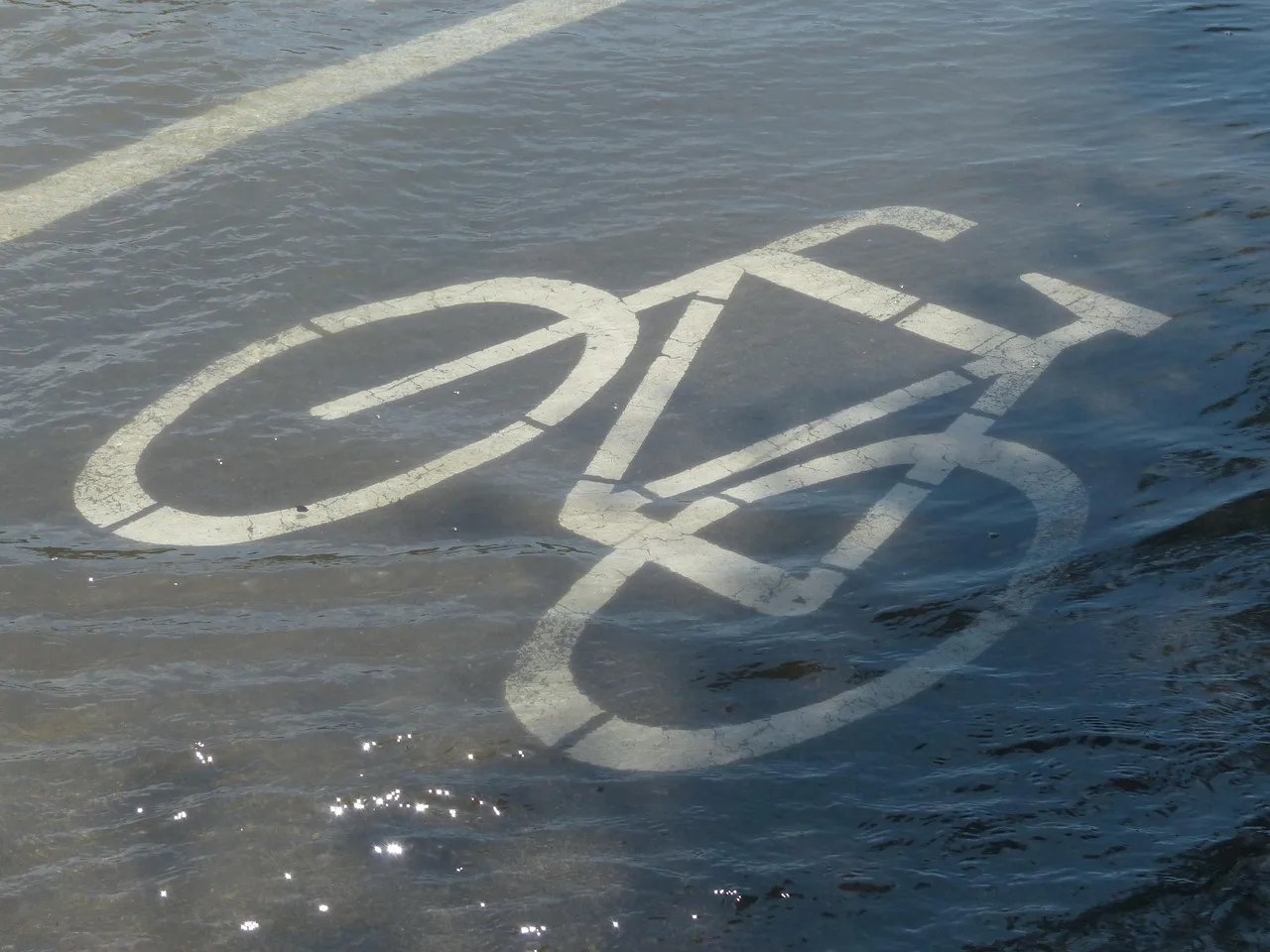 bike path, cycle path signs, character, bicycle, bicycle path, flood, path, road, flooded, nature, flooding, water, riverbank, promenade. Timing a bike trail town visit around floods and closures