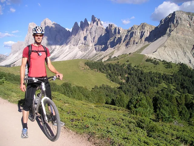 mountain bikers, mountain bike, bicycle, trip, alpine cross, nature, transalp, cycling tour, bike tour, to go biking, mountains, dolomites, south-tirol, geisler group, cyclist, helmet. What bike tour groups need from trail town businesses to plan a stop