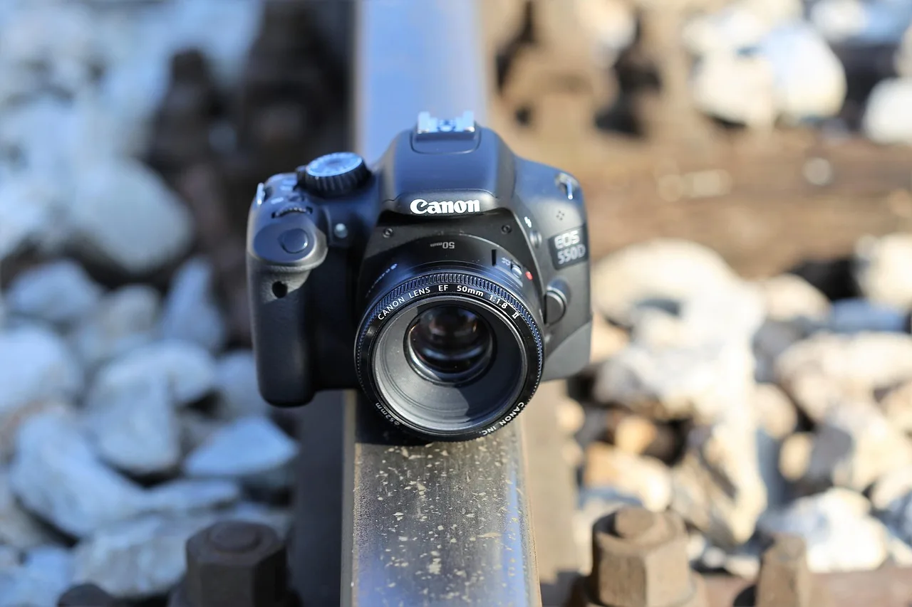 camera on railway, photo on rail, traveler, trip, station, photography, rail track, outdoor. Photographing a Rail Trail Town Solo: Camera Settings for Cyclists Riding Alone