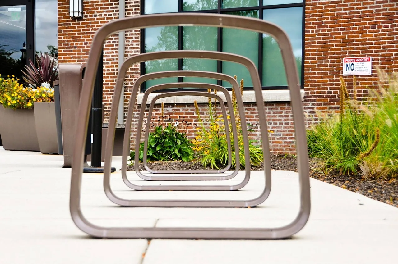 bike rack, perspective, rack, urban. What it costs to move the gear: racks, trains and hire (2027 update)