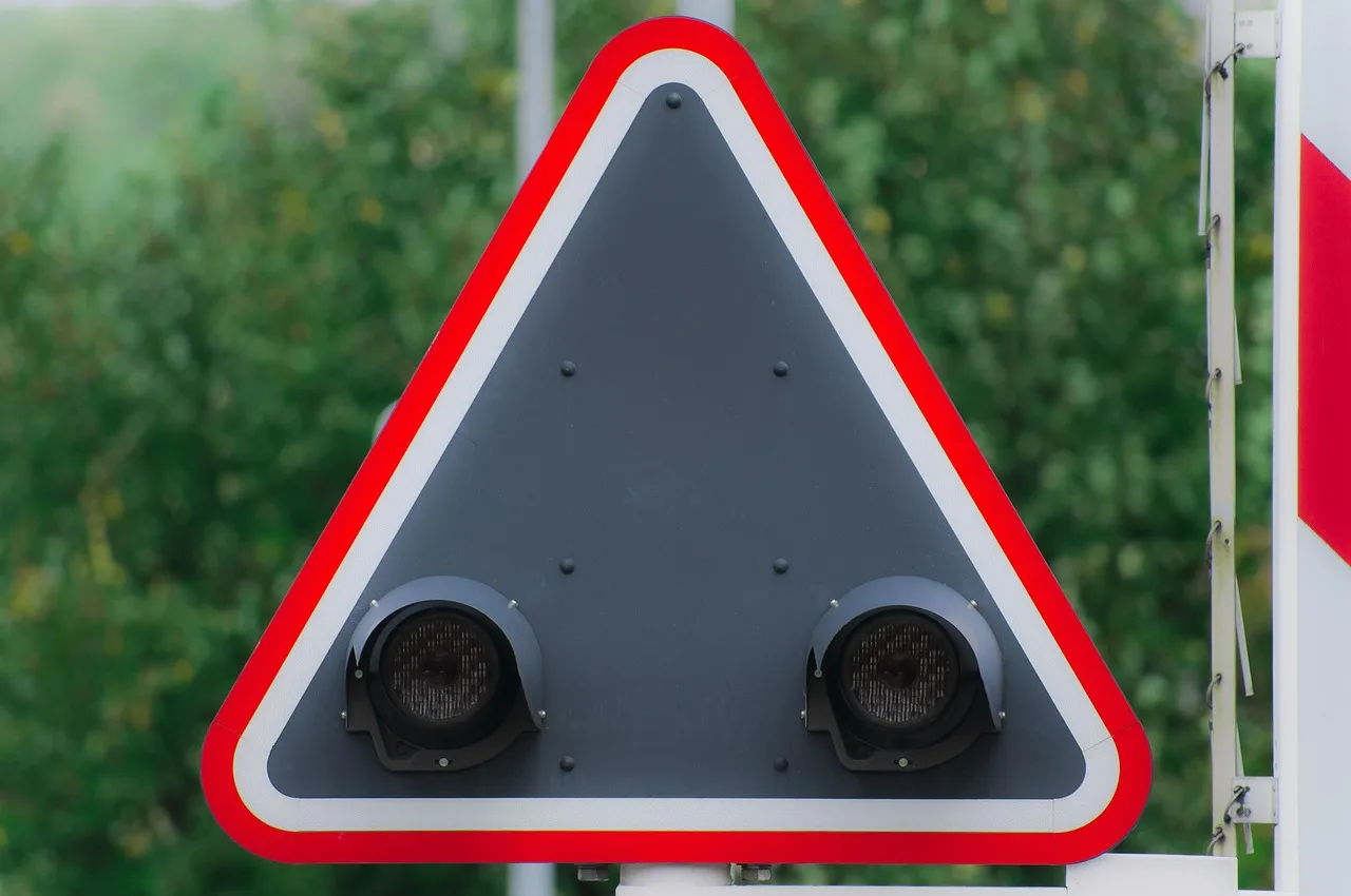 railroad crossing, railroad, warning, traffic light, red, caution, signal, crossing, transport, security, danger, symbol, traffic signs, railroad tracks, route, traffic, cabinets, train. Cycling Trip Mistakes Tips: Railroad and Left Turns