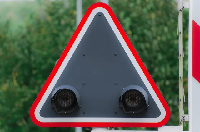 railroad crossing, railroad, warning, traffic light, red, caution, signal, crossing, transport, security, danger, symbol, traffic signs, railroad tracks, route, traffic, cabinets, train. Cycling Trip Mistakes Tips: Railroad and Left Turns