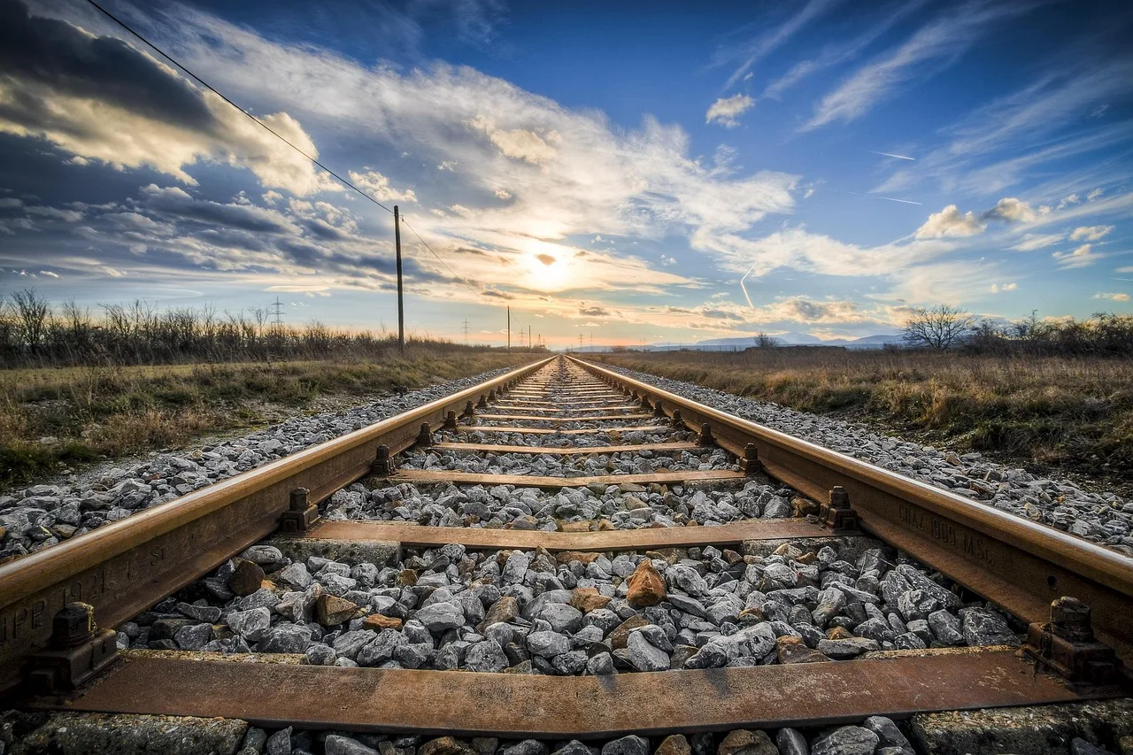 railway, rocks, sunset, sun, sunlight, track, rail, rail track, railway track, rust, rusted, abandoned, nature, railroad track, evening atmosphere, landscape, countryside. Rail trail trip costs: which corridors charge and what adds up