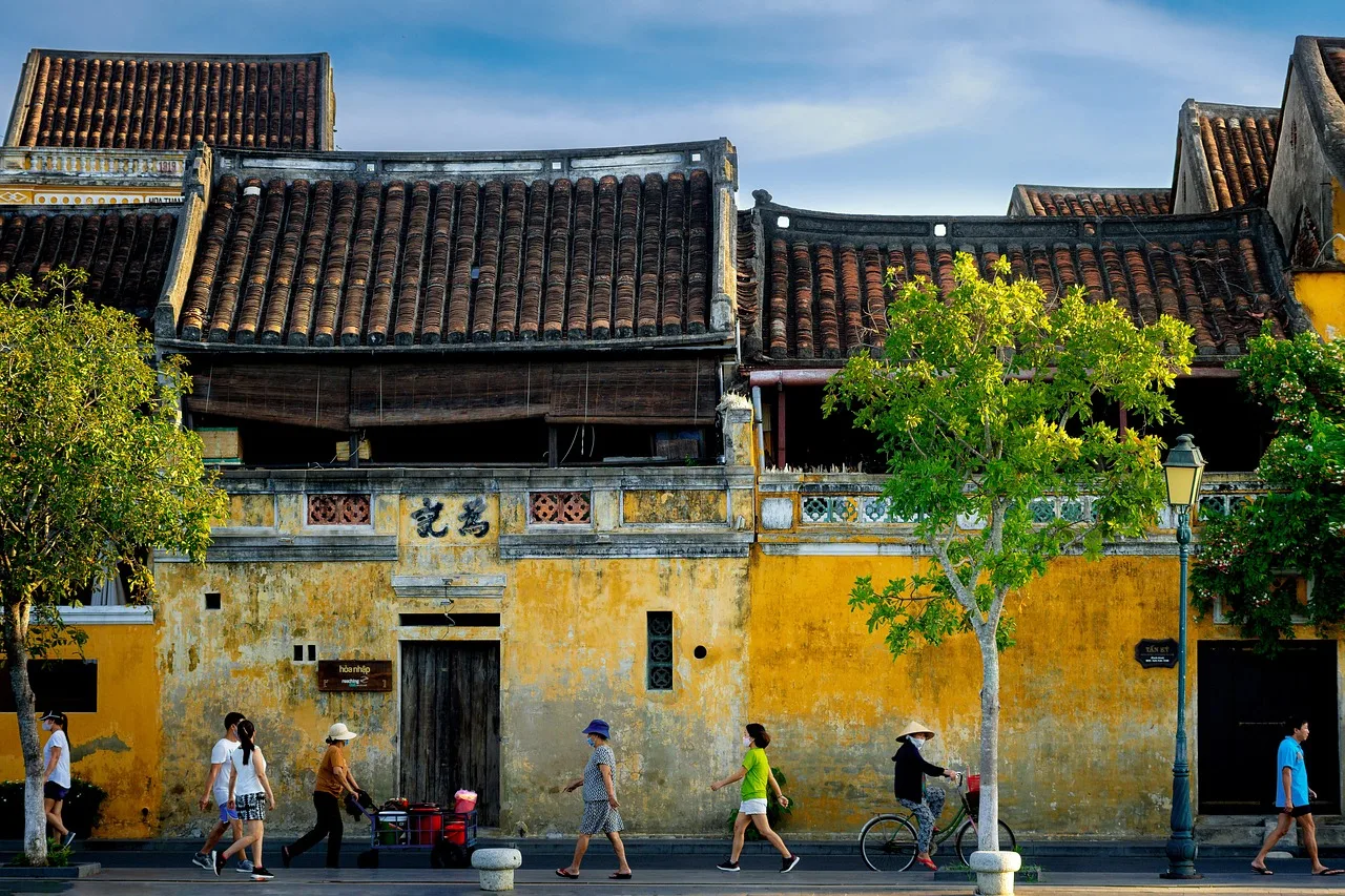 people, street, hoi an, sidewalk, bicycle, town, walking, cycling, buildings, old buildings, old town, ancient town, historic, historical, outdoors, urban, city, vietnam, hoi an, hoi an, vietnam, vietnam, vietnam, vietnam, vietnam. 4 things the trail town case studies teach