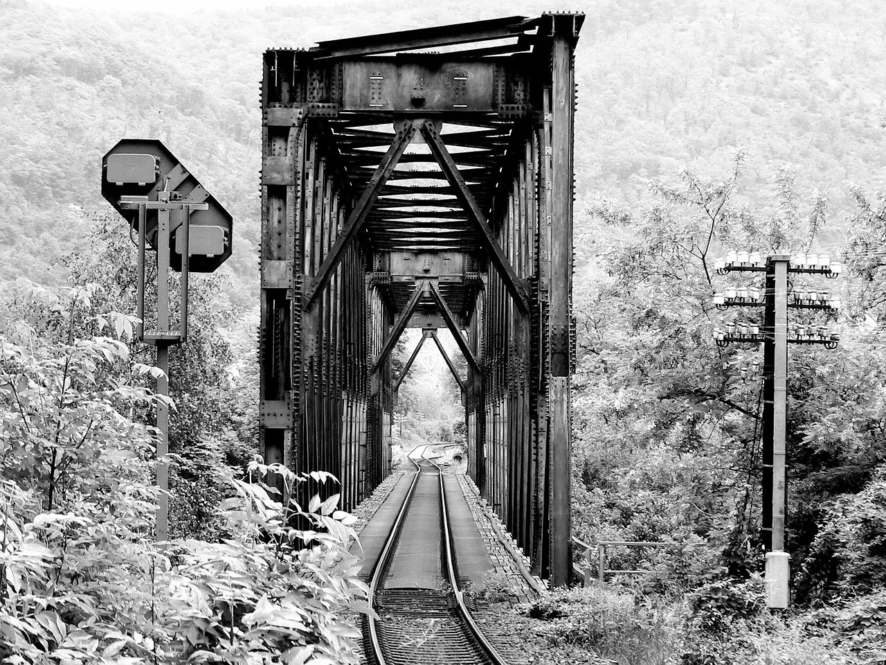 bridge, railway bridge, rail, rail track, railroad, railway, countryside, black and white, bridge, bridge, bridge, bridge, bridge, railway. How lodging choice quietly drives a rail trail trip's total cost