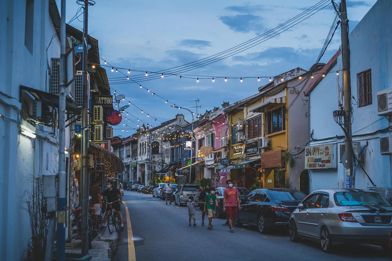 sunset, street, town, nature, people, walk, walking, night. How to judge where to stay in a trail town: street speed, corridor uses, the walk to dinner