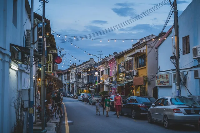 sunset, street, town, nature, people, walk, walking, night. How to judge where to stay in a trail town: street speed, corridor uses, the walk to dinner
